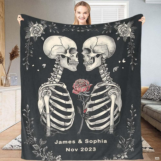 Lifestyle view showing gothic skull lovers design held open.