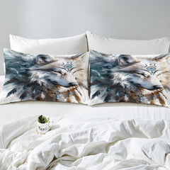 Close pillows with closed-eye wolf, blue forehead ornament, beads, and feathers