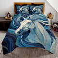 Overhead bedroom view of mosaic blue horse bedding with coordinating pillow covers on bed.