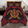 Ornate sea turtle bedding set with golden shell patterns and red filigree scrollwork on charcoal black.