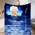 Elder portrait tribute graphic with celestial blue background and white botanical line art displayed in indoor setting