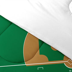 Folded presentation of baseball helmet bedding displaying sharp graphic clarity in green and gold tones