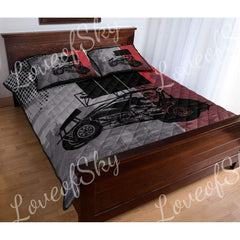 Side angle of sprint car bedding showing checkered flag motifs and racing typography across the bed