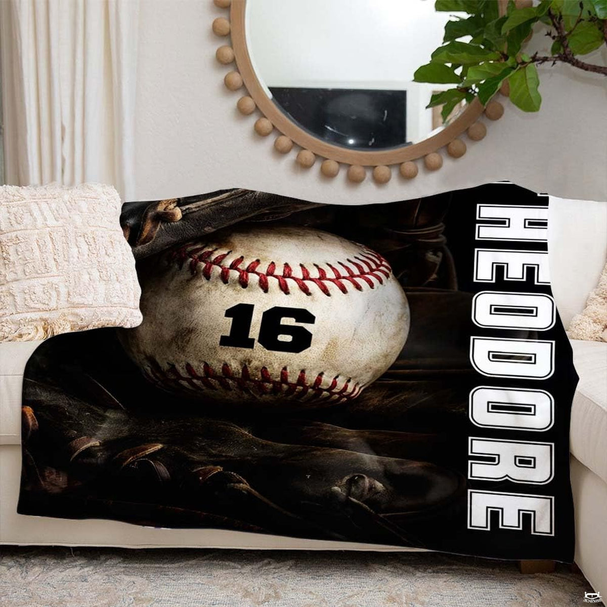Baseball resting inside a dark fielder glove beside vertical white varsity lettering, view 6.
