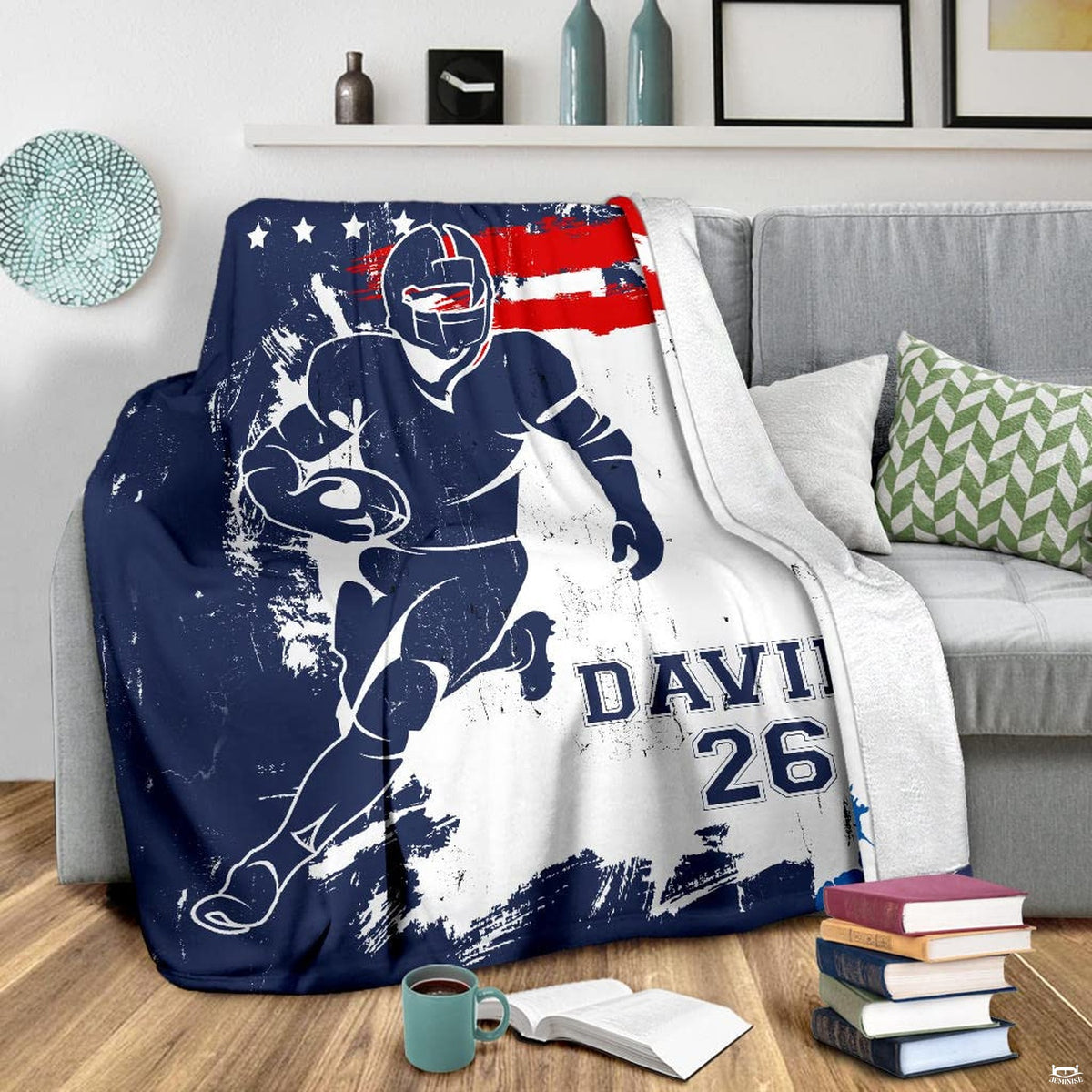 Football runner graphic blanket displayed on living room armchair