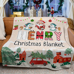 Holiday winter village graphic blanket styled across bedroom bed
