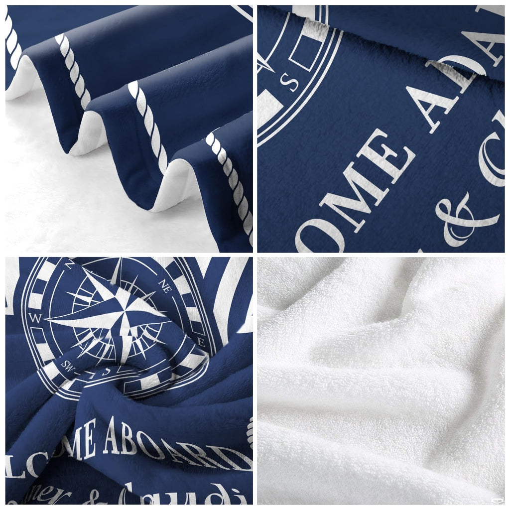 Nautical compass rose throw blanket folded neatly showing navy cabana stripes and rope edge