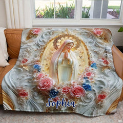Our Lady of Fatima blanket draped across an armchair in a sunlit living room setting.