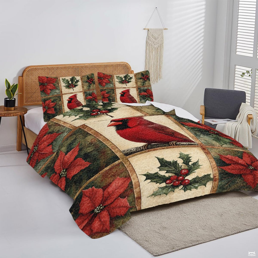 Overhead display of midnight cardinal bedding arranged neatly over a mattress in a bright bedroom