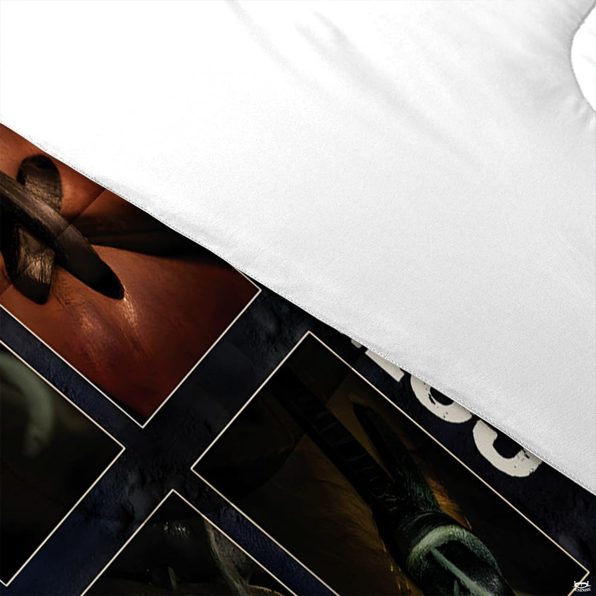 Detailed shot of distressed collegiate lettering and red seam graphics on sports theme bedding.