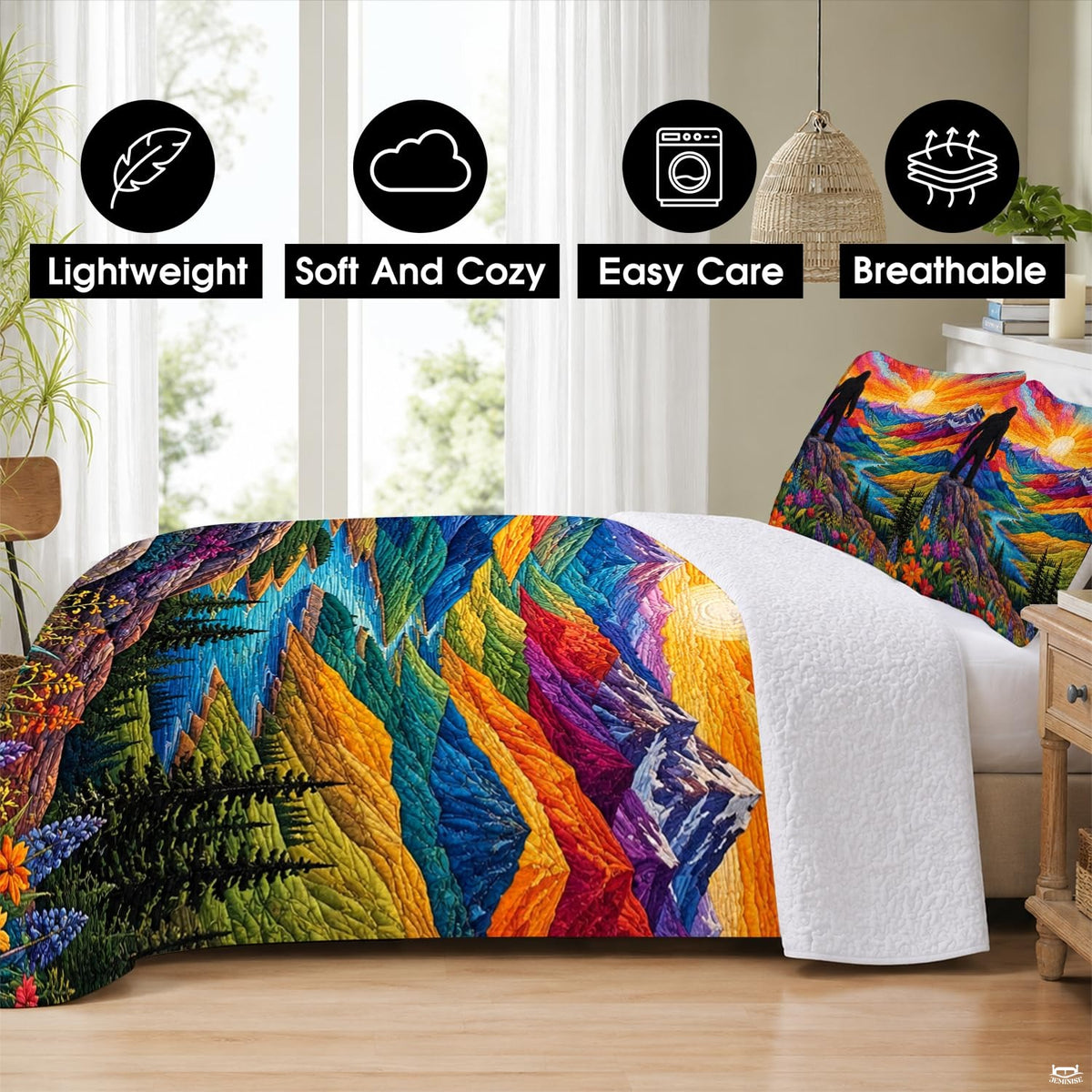 Matching pillow shams displaying a mountain sunrise and wildflower valley on an alpine bedding set