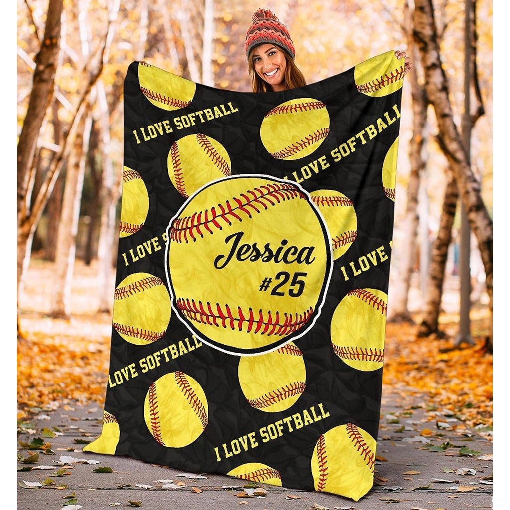 Fastpitch optic balls textile drape laid flat against neutral background