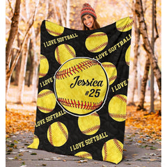 Fastpitch optic balls textile drape laid flat against neutral background