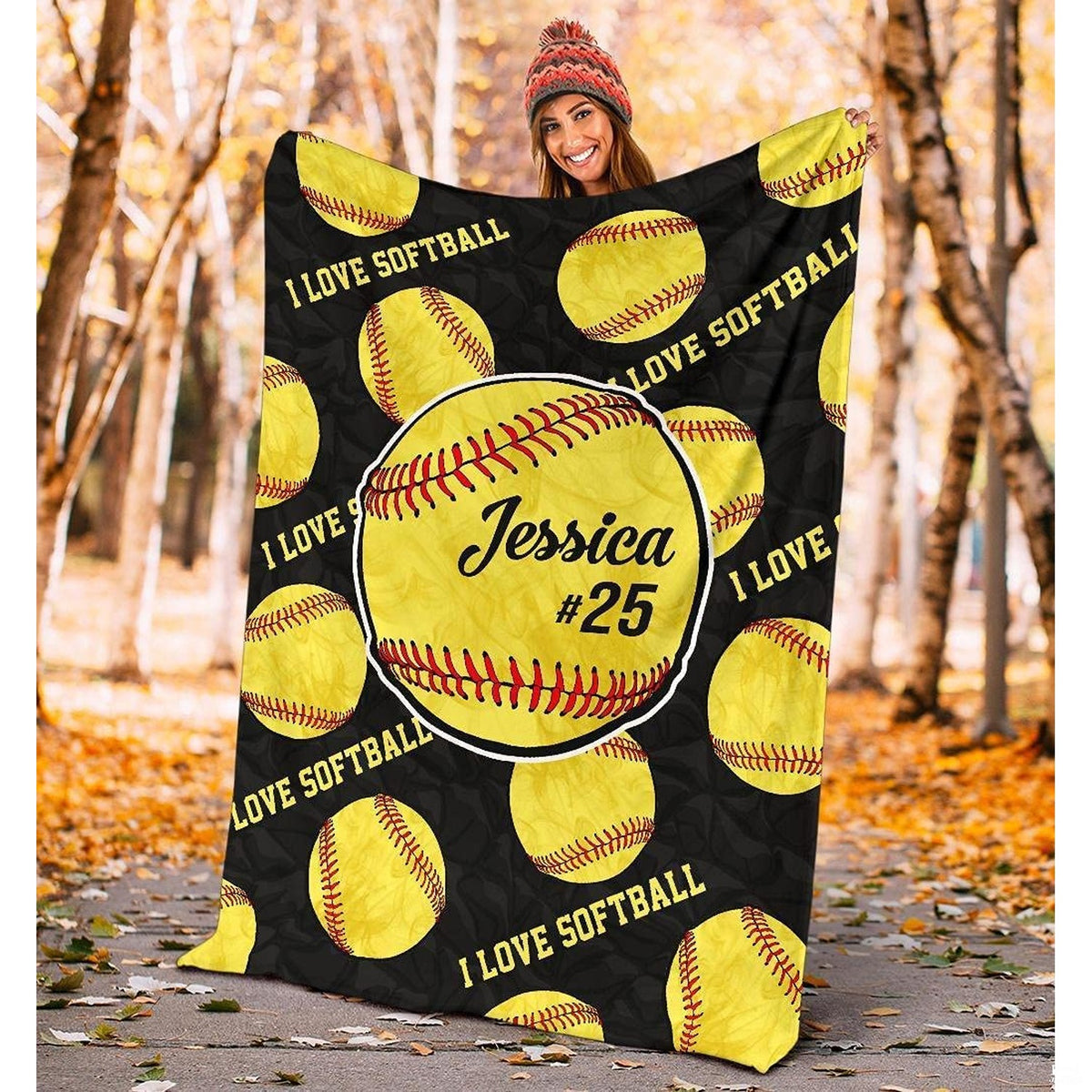 Fastpitch optic balls textile drape laid flat against neutral background