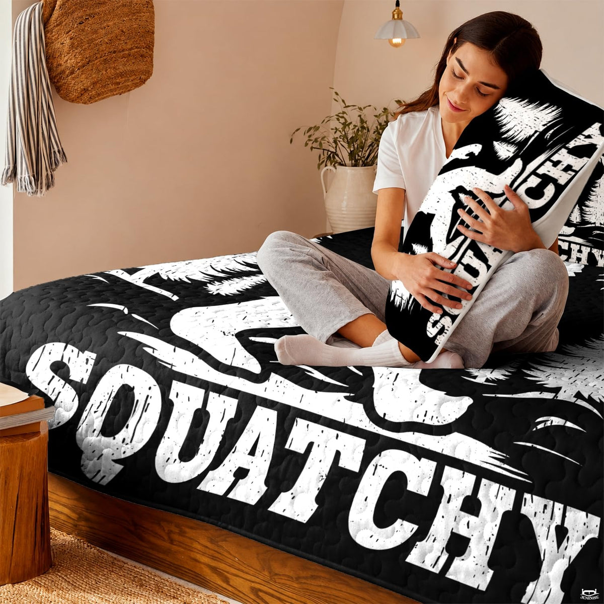 Rustic cabin bedroom featuring high-contrast Sasquatch decorative motif.
