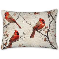 Overhead display of birch cardinal bedding arranged neatly over a mattress in a bright bedroom