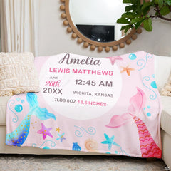 Pastel mermaid tails blanket neatly folded in nursery space