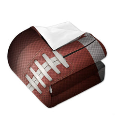 Overhead view of split panel football bedding spread across a contemporary youth bedroom bed