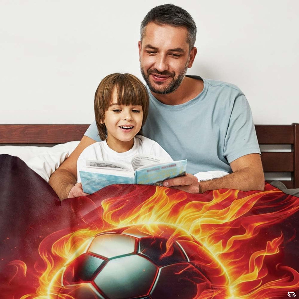 Flaming soccer textile draped across bed during story time