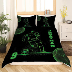 Angle view of soccer sports bedding illustrating muted sage green and midnight pitch graphic textures