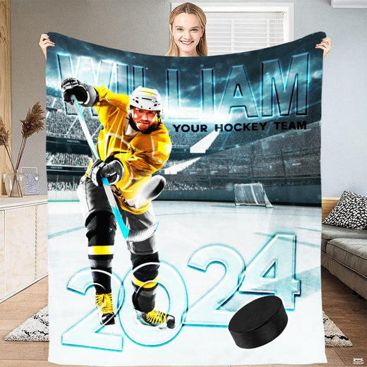 Ice hockey player taking a slapshot in a floodlit arena stadium, view 1.