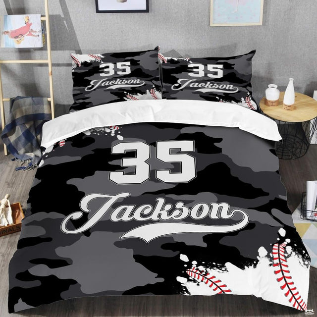 Urban bedding set showcasing grayscale camo pattern with red baseball seam artwork.