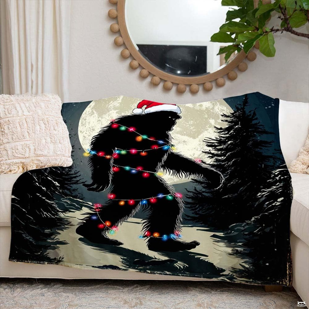 Bigfoot in a Santa hat wrapped in colorful Christmas lights under a full moon, view 6.