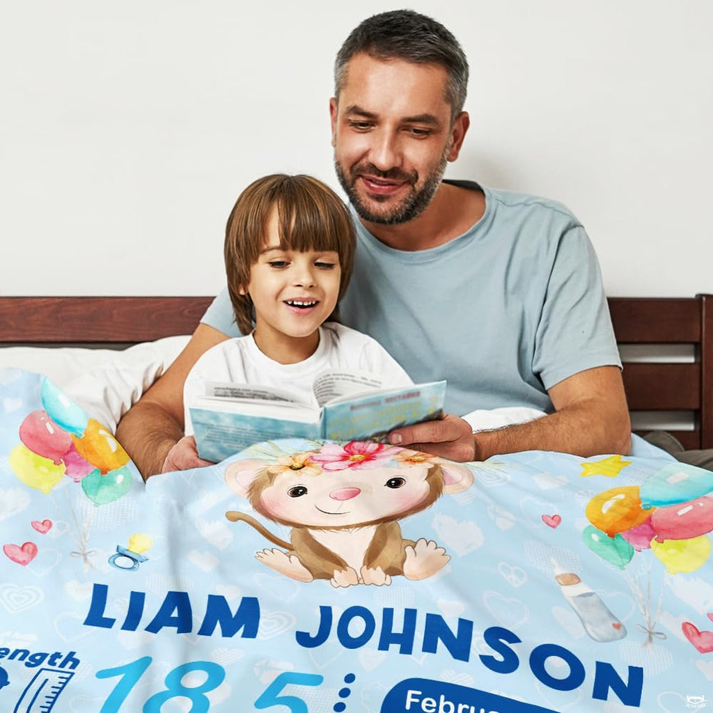 Overhead presentation of sky blue baby monkey blanket