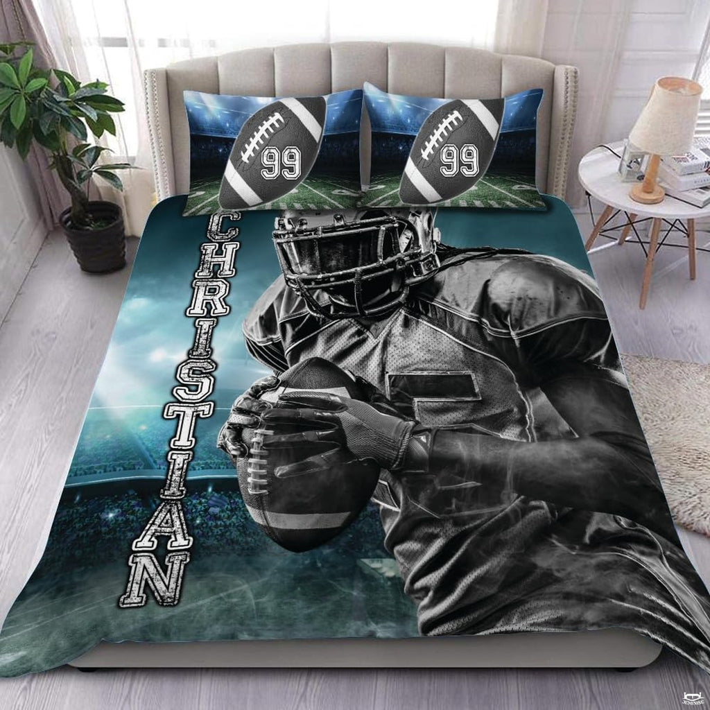 Steel grey football sports bedding featuring textured football graphic and yard lines on a bed
