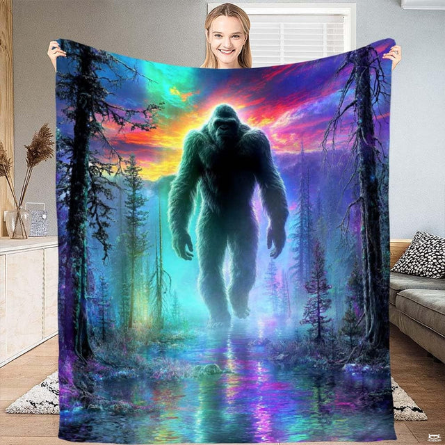 Bigfoot aurora pine forest mystic throw blanket displaying Sasquatch walking under colorful northern lights