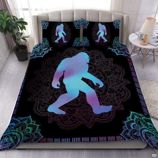 Bigfoot mandala bedding featuring a cyan and purple gradient silhouette on intricate black lace pattern
