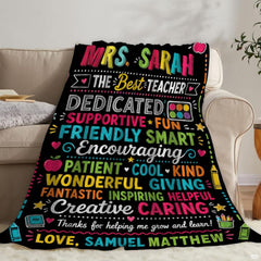 Artistic detail of books, apples, and colorful stars on bedding set.