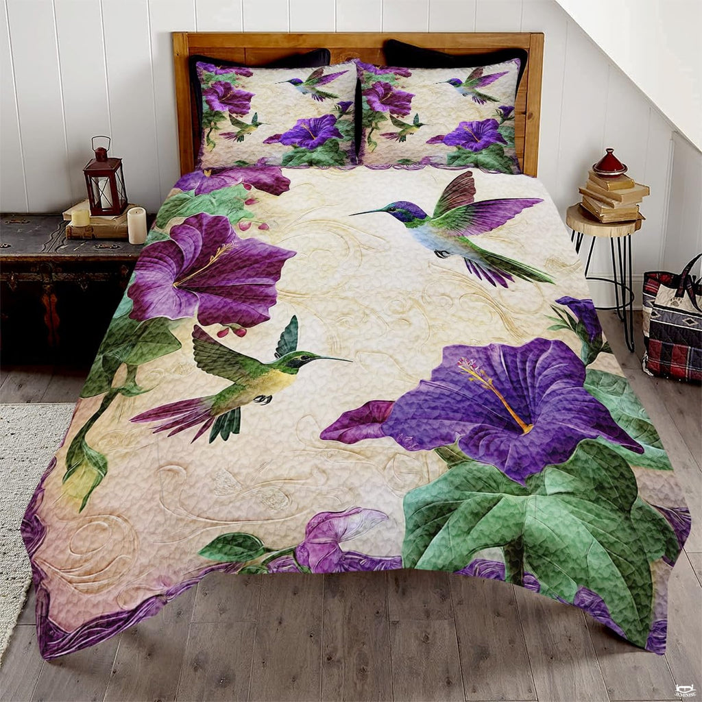 Purple flower hummingbird bedding displayed in a bright bedroom