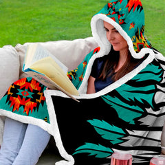 Aztec design bedding set display featuring bold tribal chief illustration and Southwestern room decor accents.