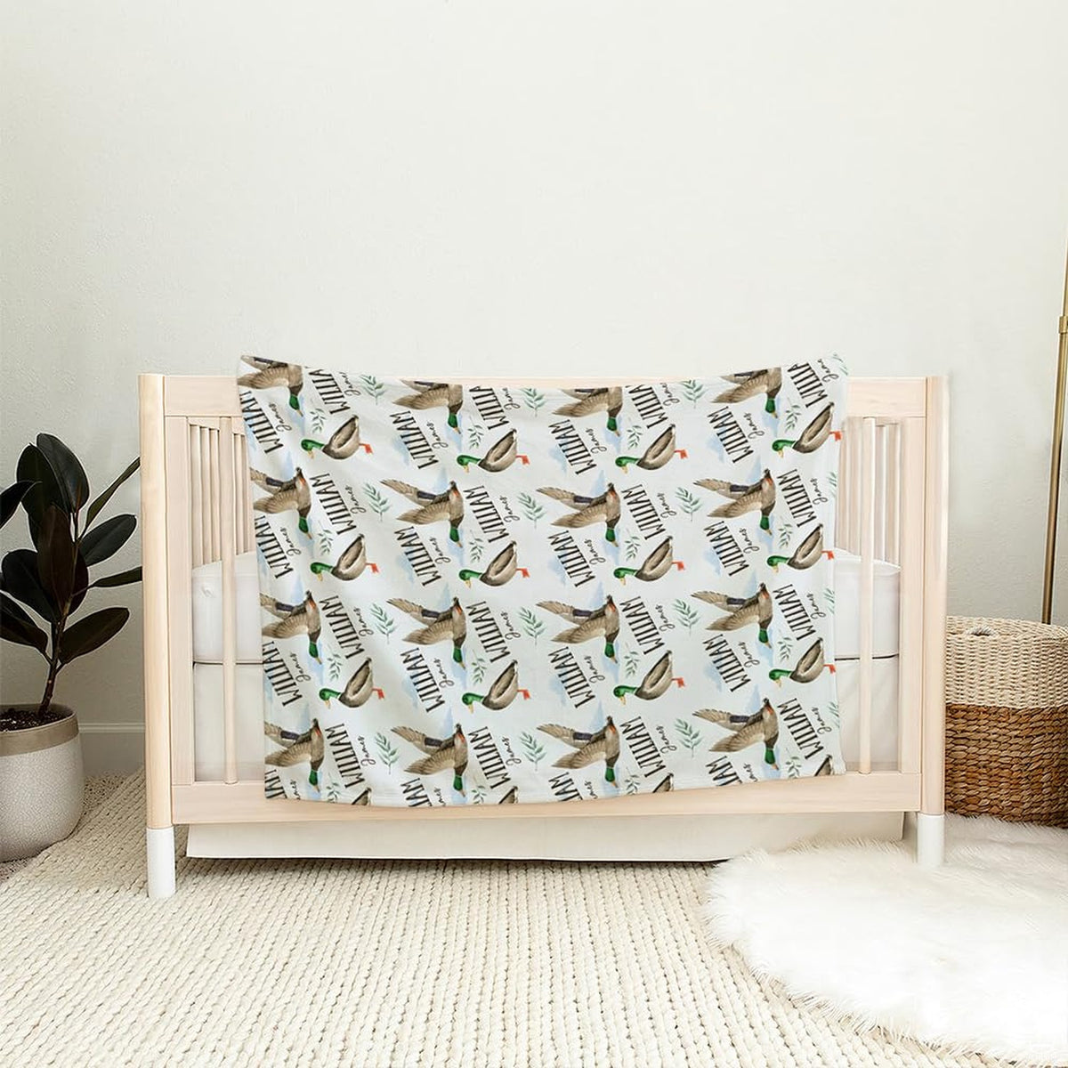 Waterfowl pattern bedding styled in a rustic bedroom arrangement beside a complementary bed stand set of 2